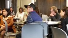 a variety of conference participants sit in the South Cascade room