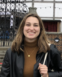 Me standing in front of Shakespeare's Globe